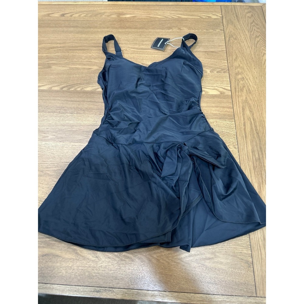 Black‎ one piece with skirt